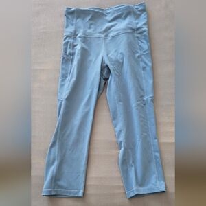 Small blue capri-length leggings with pockets!